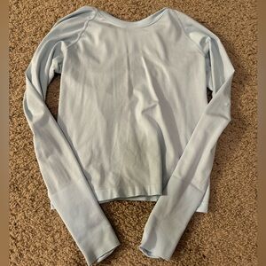 light blue, long sleeve swiftly, tech size 4 worn once can negotiate price